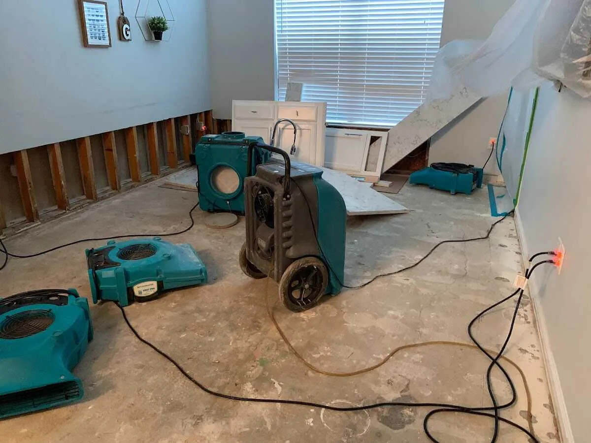 Dehumidifier in flood-cut room for Water Damage Restoration in North Fayette